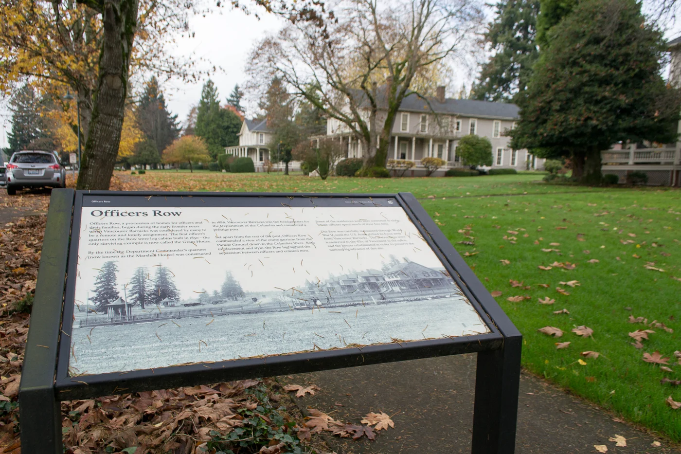 Historic homes and an interpretive sign along Officers Row in Vancouver, Washington